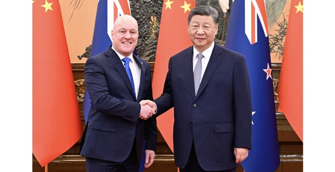 习近平会见新西兰总理拉克森