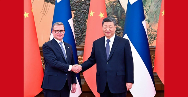 习近平会见芬兰总理奥尔波