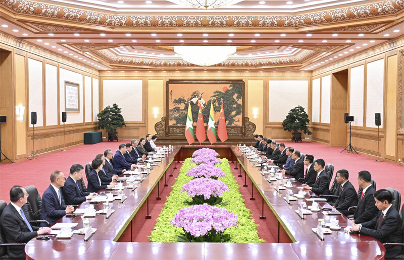 6月16日上午，国家主席习近平在北京人民大会堂同来华进行国事访问的缅甸总统敏昂莱举行会谈。图片来源：新华网