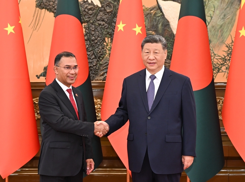 6月26日上午，国家主席习近平在北京人民大会堂会见来华正式访问的孟加拉国总理塔里克。图片来源：新华网